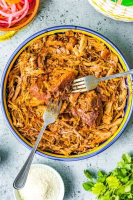  Cochinita Pibil: Een Smeltkroes van Caribische Kruiden en Zacht Gebraden Varkensvlees!